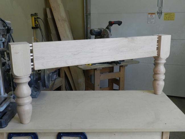 photo of dry fitted dowel joints between rail and legs used to build the coffee table frame assembly