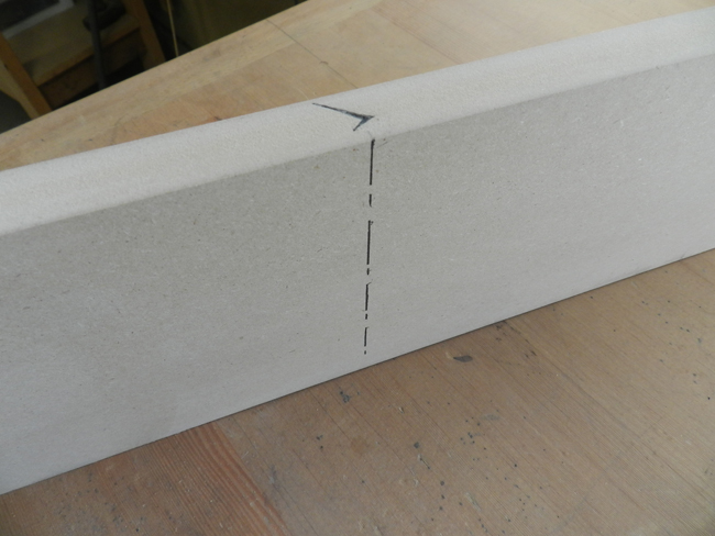 Center line for dowel bores on inside of outer rail to cross member joint used to build the coffee table frame