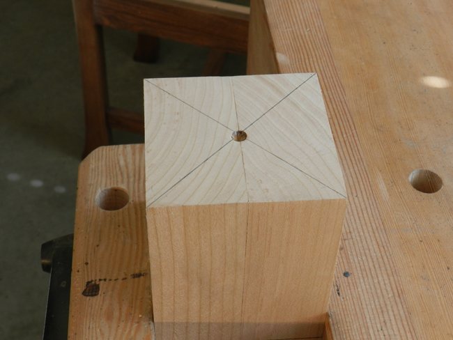 photo of location point for lathe centers at end of a turned leg as example 