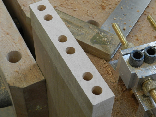 photo of dowel joint bore detail between rail and leg used to build the coffee table frame assembly