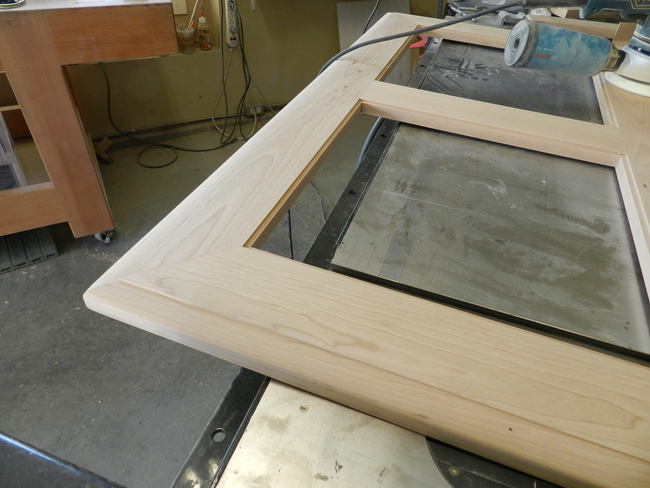 photo of the assembled components used to build the coffee table top after sanding with a Bosch orbital sander