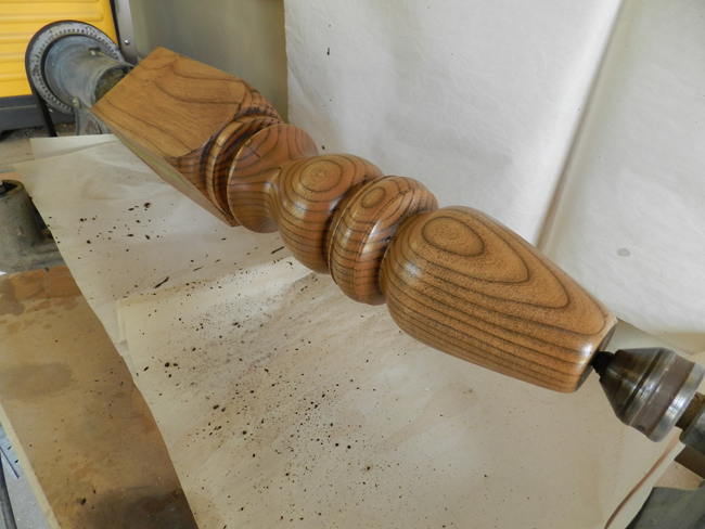 photo of turned leg component used to build the coffee table frame assembly after staining