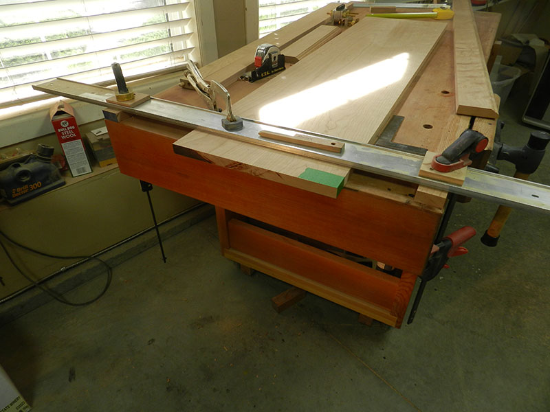 router-fence-clamped-perpendicular-to-long-edge-of-book-case-top-plate