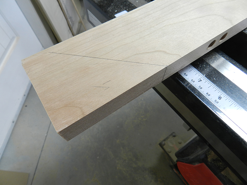 scribed-reference-line-for-drilling-into-mitered-edge-rail-before-cutting-miter