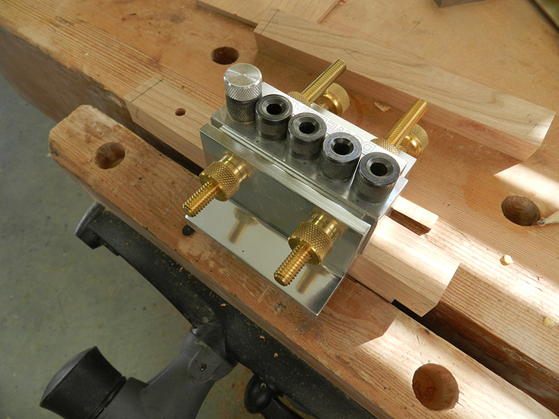 Dowelmax dowel jig index pin used to extend drilled bores along the length of the plant stand lower shelf rails.