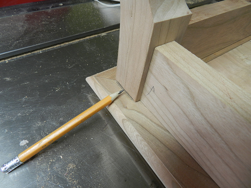 Plant stand project lower frame assembly placed upside down on top plate to mark the section to be reduced to provide overlap.