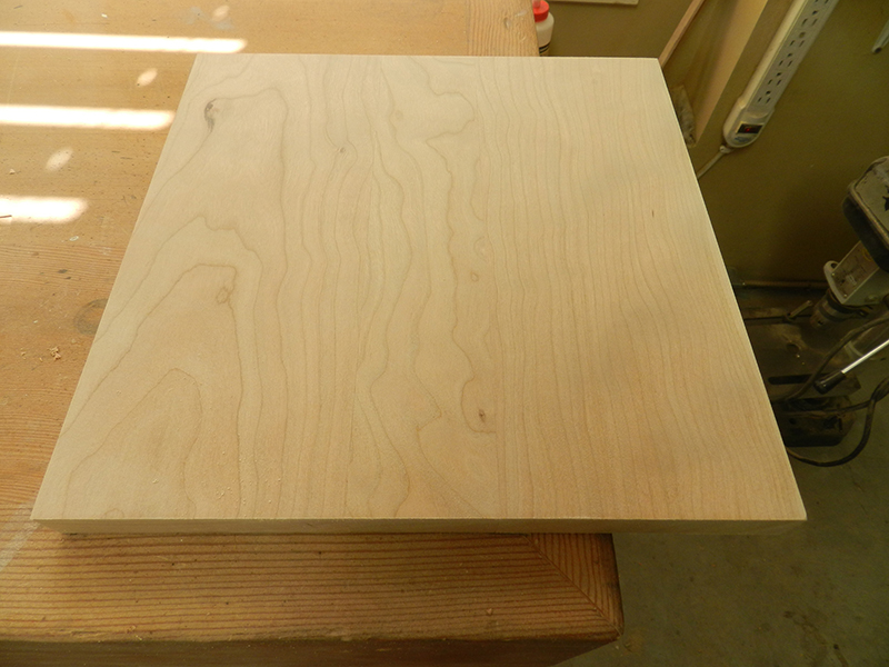 The two work pieces with jointed edges for the main section of the plant stand top plate fitted together.
