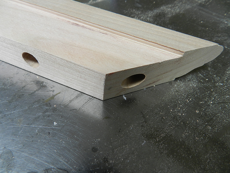 Lower surface of the plant stand top perimeter rail reduced to provide the overlap connection to the lower frame section.