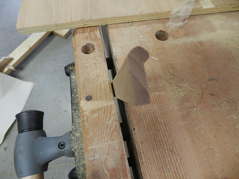 Shape of decorative moulding for plant stand perimeter rails after routing edge profile.