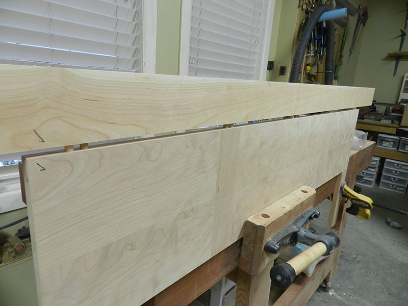 photograph of dry fitted front rail to center panel dowel joint used to build the entryway table top assembly forward section