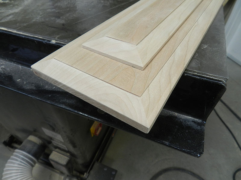 photograph of routed inner and outer panels laminated to build the entryway table drawer front assembly
