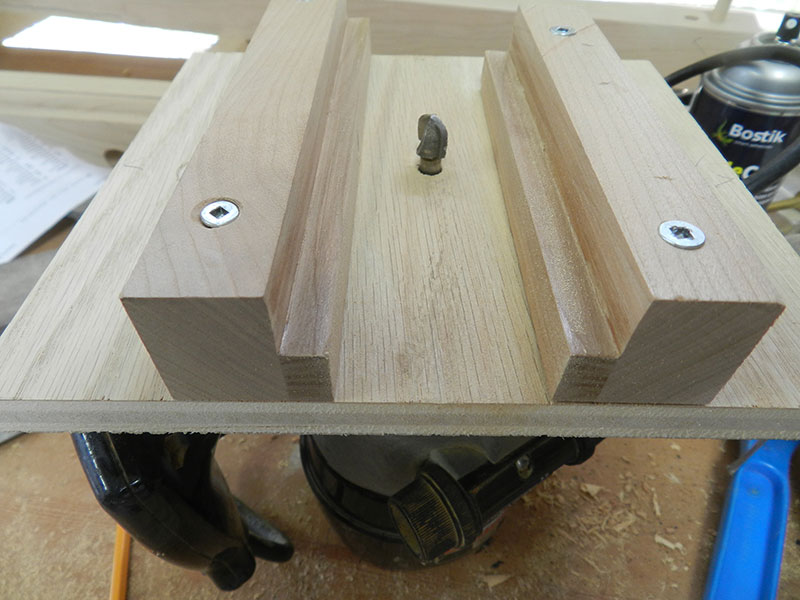 photo of box style router jig for cutting scalloped grooves on stile inserts used to build the armoire frame assembly front section