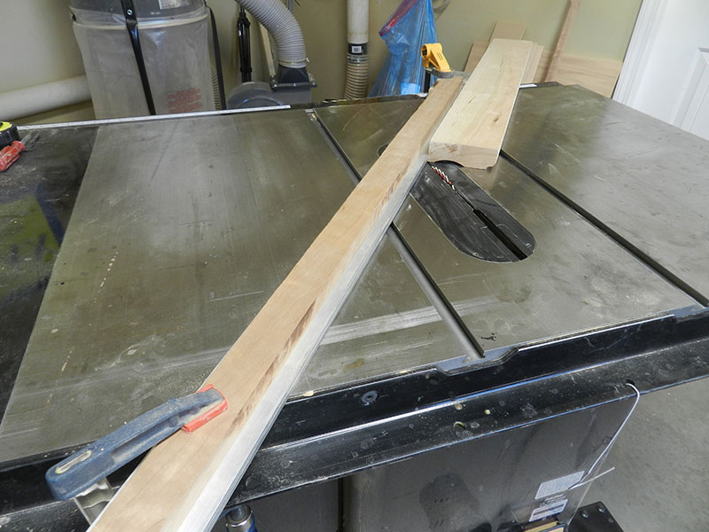 photo of concave profile milled by table saw into work piece used to build the armoire chippendale feet