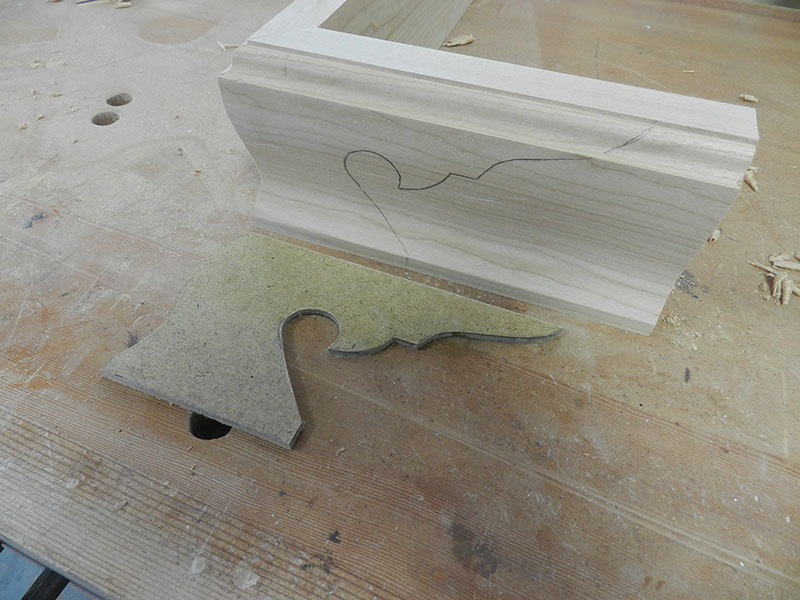 photo of cut line produced with template on work piece used to build the armoire chippendale feet
