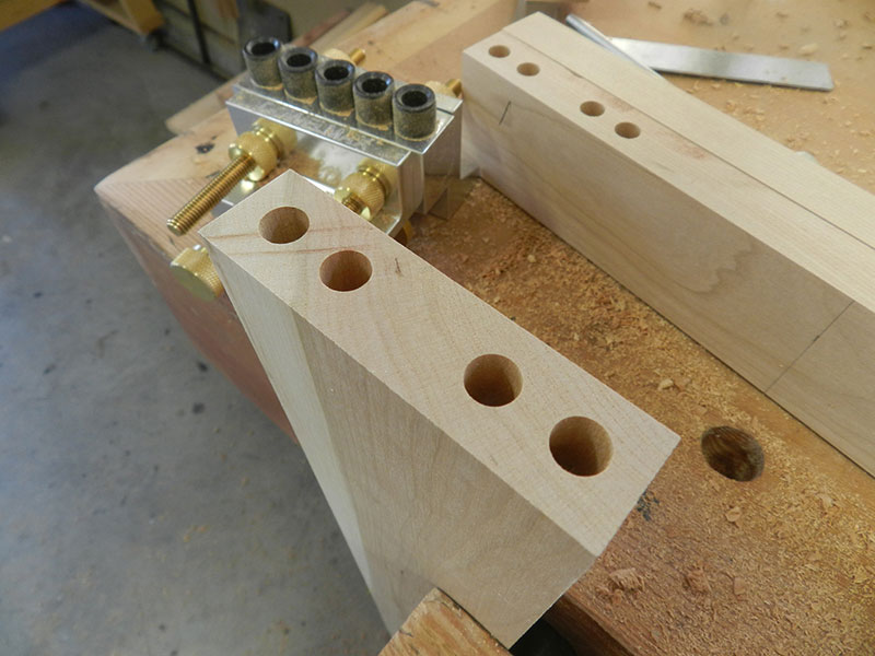 photo of dowel bore detail at end of the top rail used to build the armoire frame assembly front section