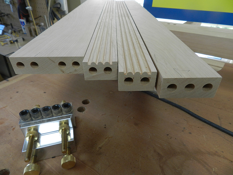 photo of dowel bore detail at ends of rails used to build the armoire frame assembly front section