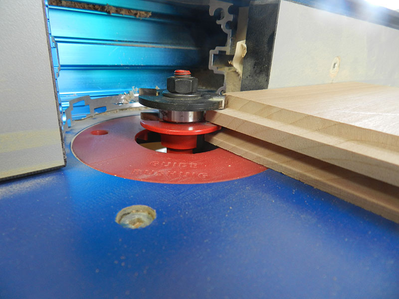 photo of stub tenon cut with router bit on stile work pieces used to build the armoire raised panel side sections