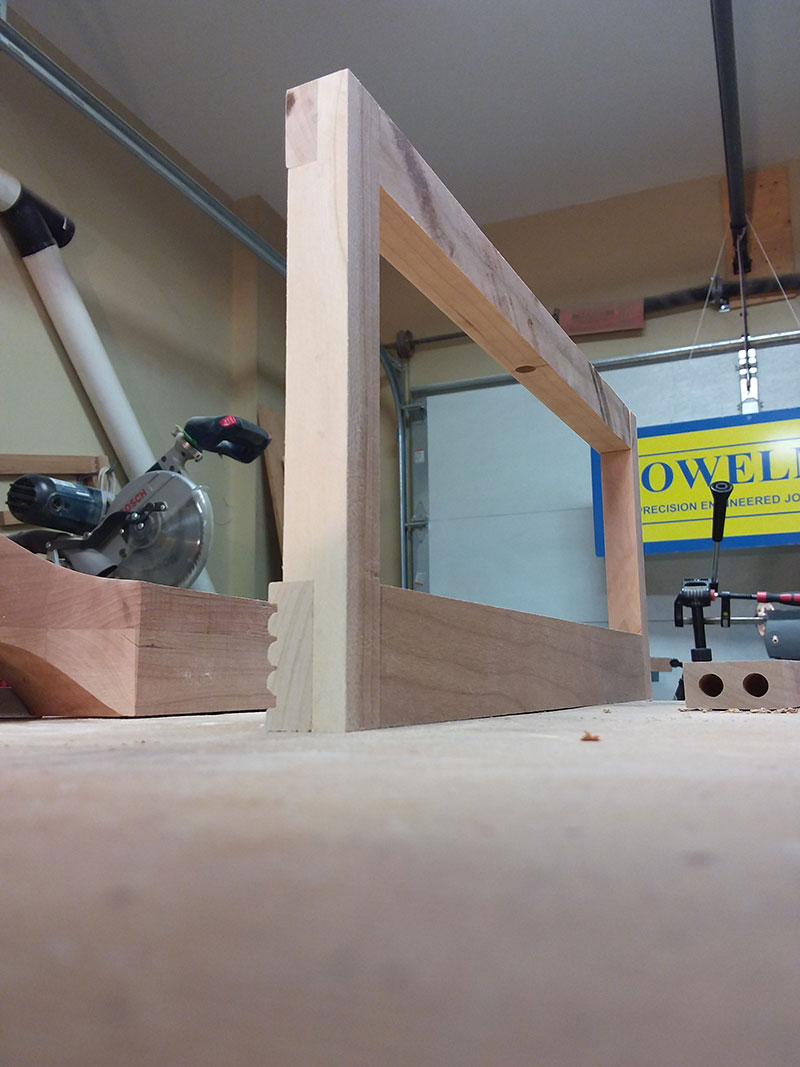 photo of the half lap joints between the rails and stiles used to build the bedroom table drawer fascia assembly