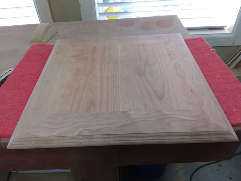 photo of joined mitered rails and center panel used to build the bedside table top assembly