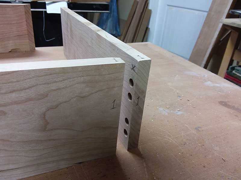 photo of referencing system numbers for the multiple dowel joint used to build the bedside table drawer wall rear section